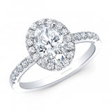 14kt White Gold Ring featuring Oval Diamond in the center with a Oval Halo Style