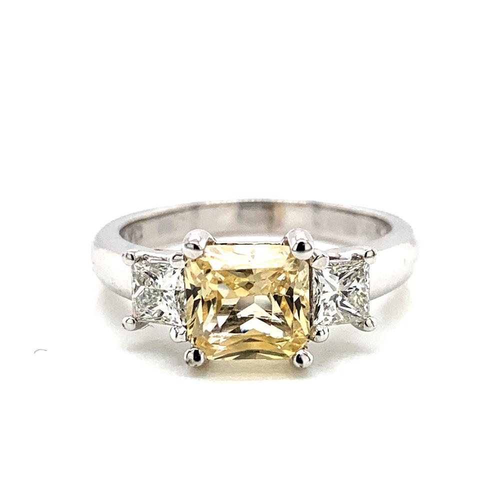 18k white gold ring with a GIA certified unheated yellow sapphire