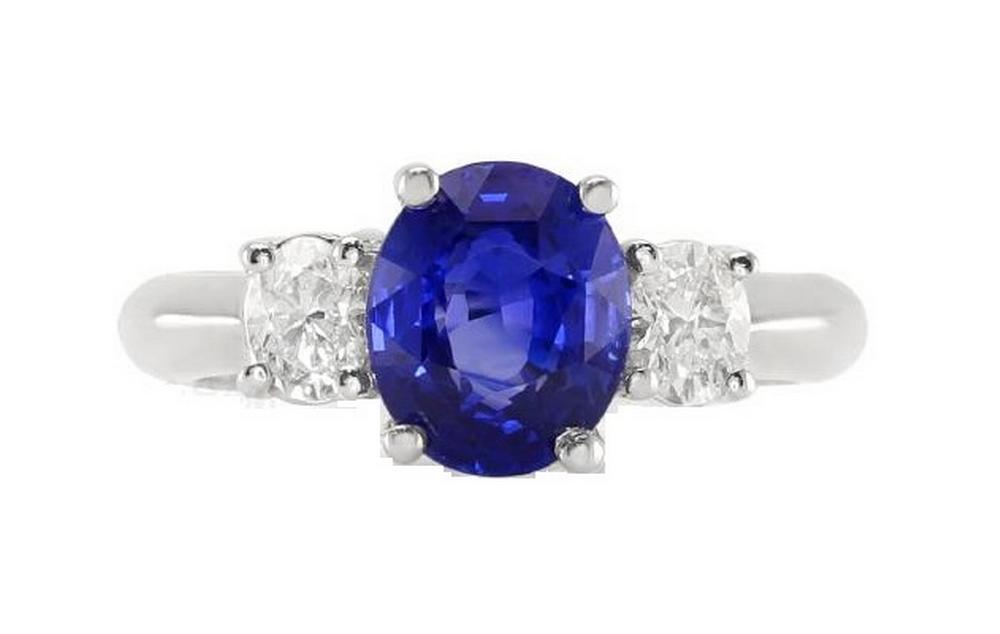 18k white gold ring with a GIA certified unheated sapphire center stone.